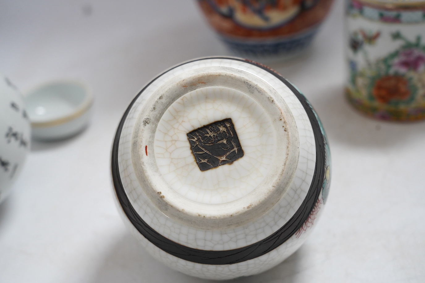 A quantity of Chinese and Japanese ceramics including Kutani, Imari, famille rose etc. tallest 22cm. Condition - fair to good